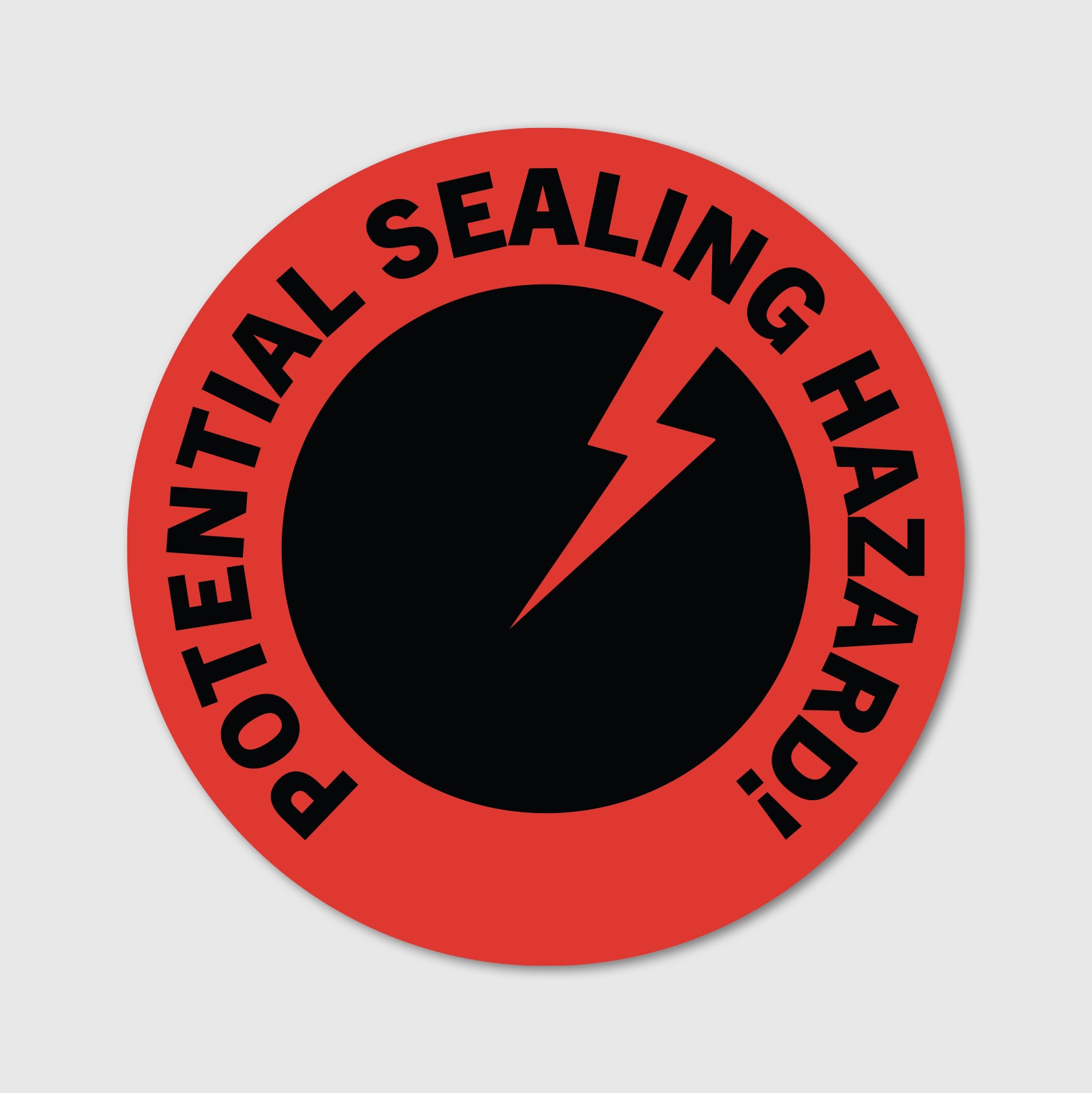 Circular warning label with 'Potential Sealing Hazard' text and a red border on a white background.